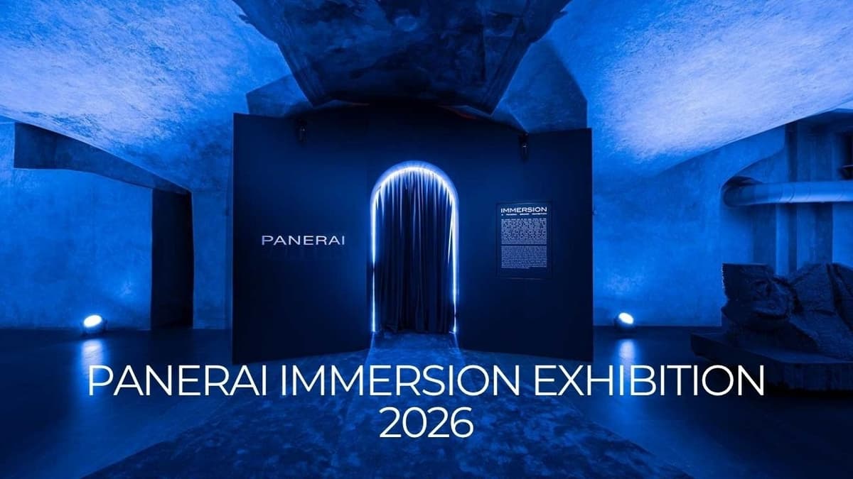 A blue-lit exhibition entrance with a curtained doorway and large text reading PANERAI IMMERSION EXHIBITION 2026.